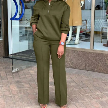 Olive green solid color loose hooded sweatsuit featuring a zippered top and wide-leg pants for casual wear