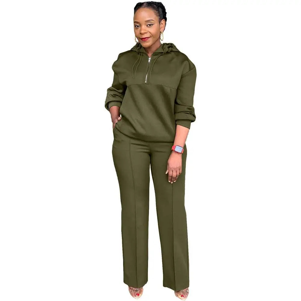 Olive green solid color loose hooded sweatsuit with half-zip front ribbed cuffs and side pockets for casual wear
