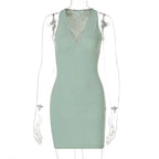 A sleek olive green stripe knitted women sleeveless dress with a deep v-neckline and sheer mesh back panel