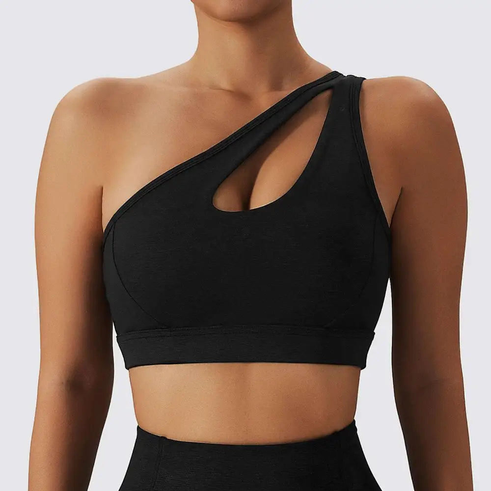 Black one-shoulder sports bra with cutout design paired with olive green yoga bra fitness suit with pockets and sports underwear gathers
