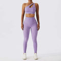 A matching lavender bra fitness suit with one-shoulder crop top cutout and high-waisted leggings in stretchy fabric