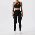 Black one-shoulder bra fitness suit with cutout detail and matching high-waisted leggings for olive green yoga sessions