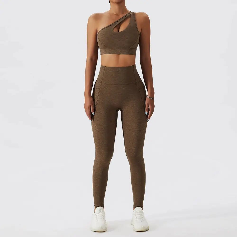 Olive green yoga high-waisted leggings with textured fabric and side pockets as part of bra fitness suit
