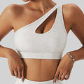 A sleek heathered gray one-shoulder bra fitness suit with cutout design from the olive green yoga collection