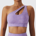 Lavender heathered sports bra with one-shoulder cutout design paired with olive green yoga bra fitness suit with pockets