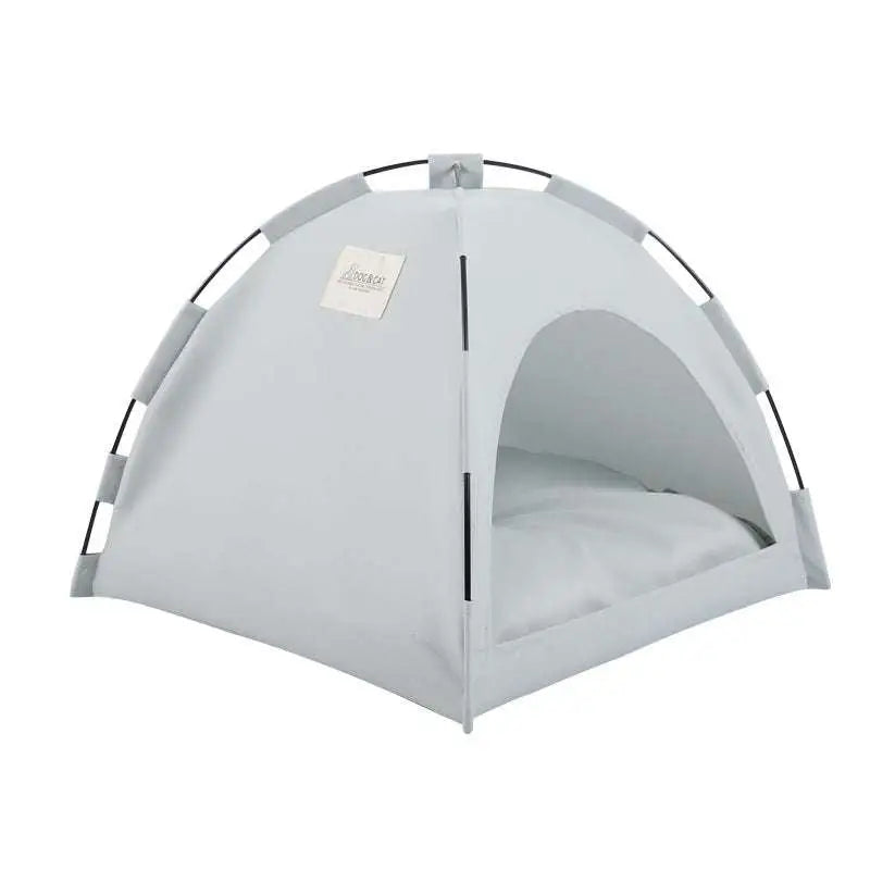 Light gray fabric cat tent with black metal frame and soft cushion inside for comfortable pet resting