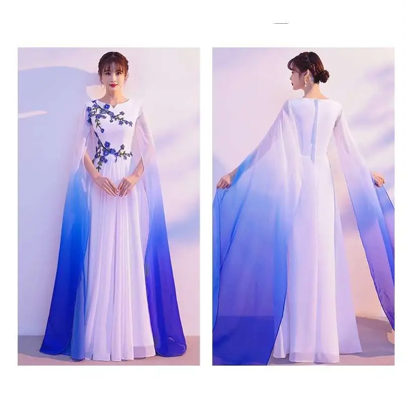 A flowing ombre cape blue floral choral dress with delicate embroidery for red song competition events