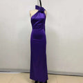 A sleek fitted high waist rose gown in deep purple satin with a halter neck and decorative rose accent at the neckline