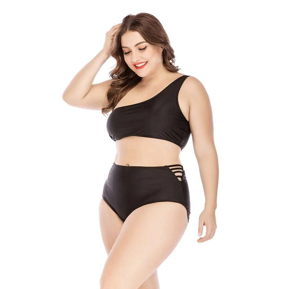 Black one-shoulder plus size swimsuit with high waist and lace-up back detailing shown from the back side