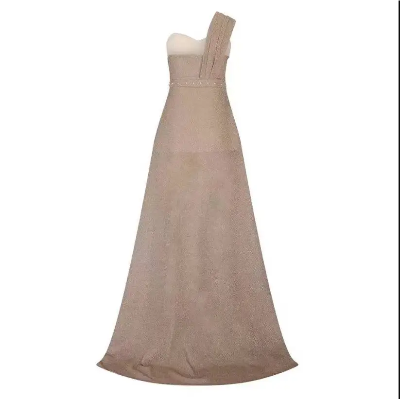 Beige one shoulder sleeveless bronzing split dress with fitted bodice, shimmering texture, and beaded belt detail