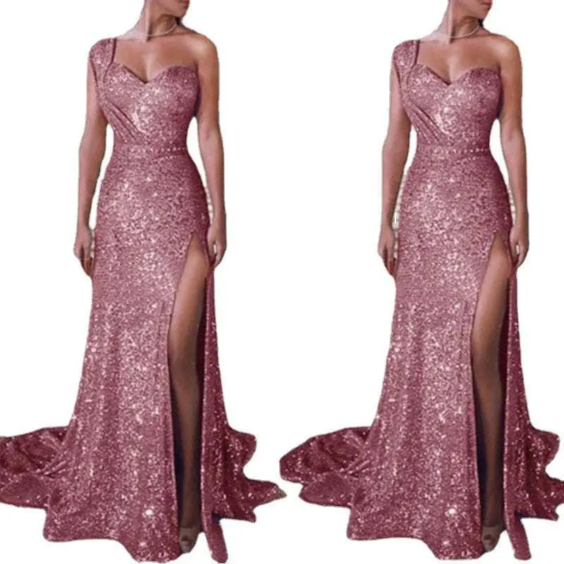 A sleeveless bronzing split rose gold evening gown with a sweetheart neckline high slit and flowing train