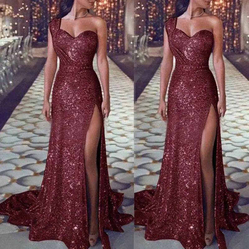 A sleeveless bronzing split dress featuring a shimmering burgundy rose gold sequined one shoulder gown with high slit