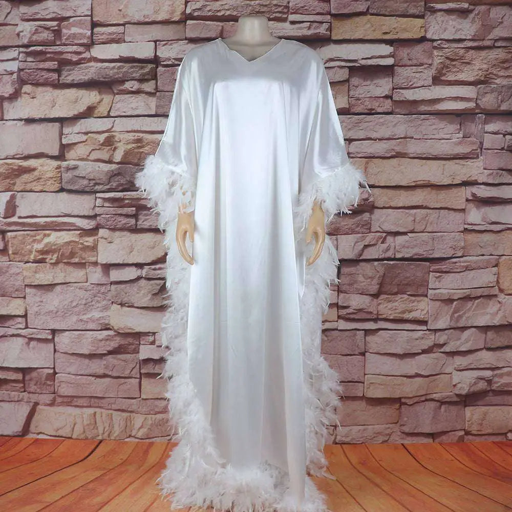 White satin dress luxury robe with orange feathered loose trim fully surrounded along sleeves and hem