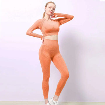 Orange jacquard seamless two-piece workout set featuring mesh details designed for yoga and activewear use