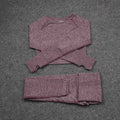 A mauve jacquard seamless yoga two piece set with long-sleeved cropped top and leggings in textured knit fabric