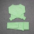Light green knit two-piece set with cropped top and leggings from the orange jacquard seamless yoga collection