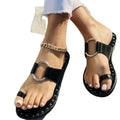 Black leather casual beach sandals with silver-toned circular buckles and studded detailing for slippers women fashion