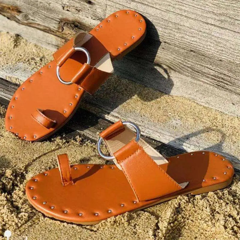 Tan leather casual beach sandals with silver studs and metal rings designed for slippers women fashion