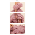 A flowing lavender off-the-shoulder tulle high low gown with ruffled layers in luxury women’s fashion eveningwear