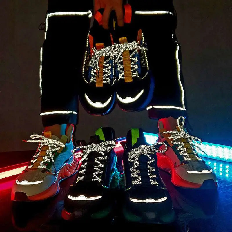 Vibrant orange mesh fashion casual running shoes with white accents, yellow laces, green details, and textured mesh upper