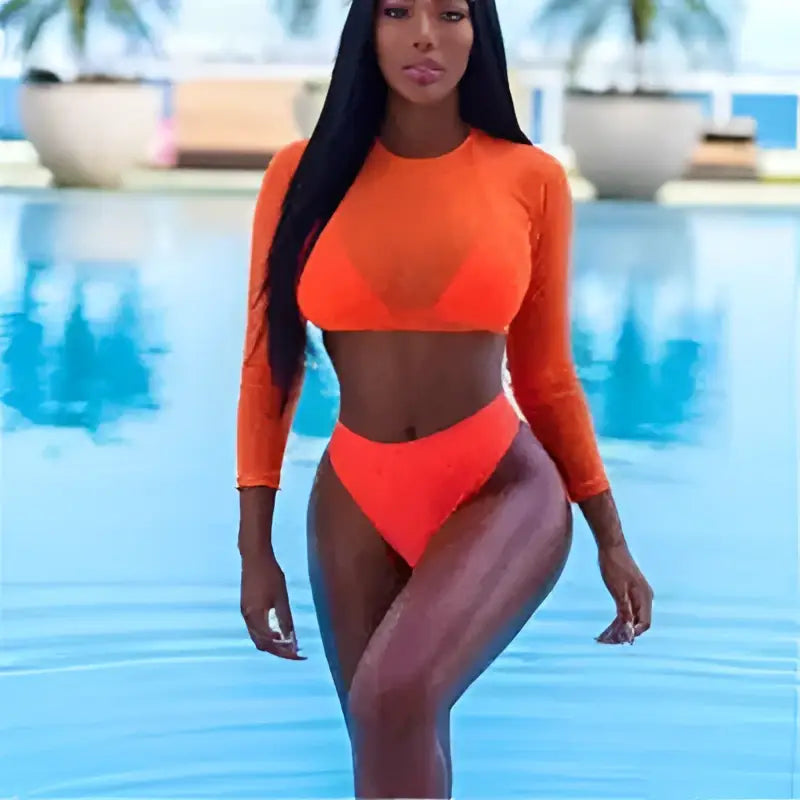 Orange mesh three piece sexy swimsuit bikini set featuring a long sleeve orange two-piece swimsuit with high neckline