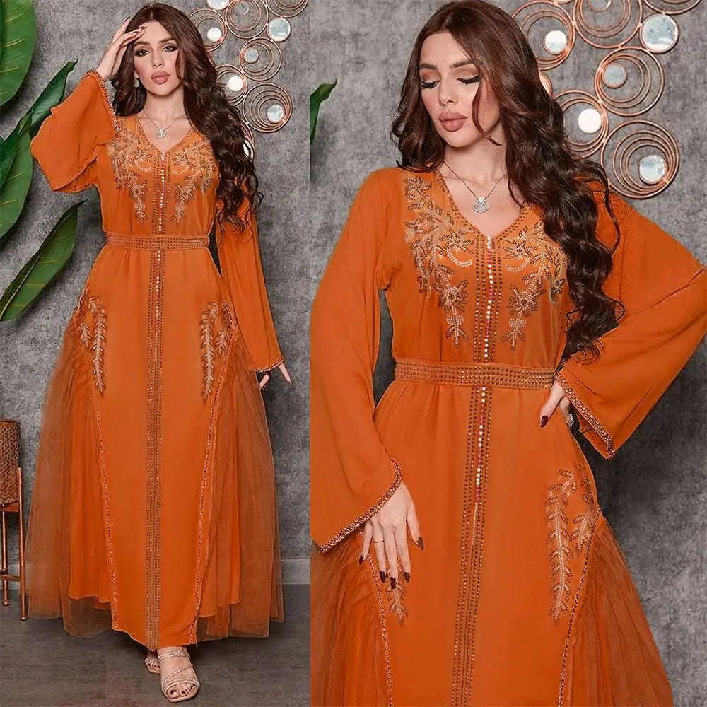 Orange middle east diamond beaded dress featuring a flowing abaya style with intricate gold embroidery and sheer overlay