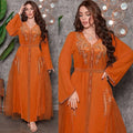 Orange middle east diamond beaded dress featuring a flowing abaya style with intricate gold embroidery and sheer overlay