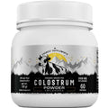 White plastic jar of everest organic colostrum powder for gut health with black and white label featuring cow and mountains