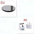 Black circular electric mug cup warmer with glossy finish and subtle center indicator light for ornate glass cups