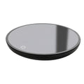 Black circular electric mug cup warmer with smooth reflective surface and subtle white indicator light for ornate glass mugs