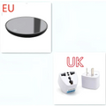 Black circular electric mug cup warmer with glossy finish and subtle center indicator light for ornate glass cups
