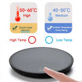 Black circular electric mug cup warmer with temperature settings for ornate glass tea and coffee cups