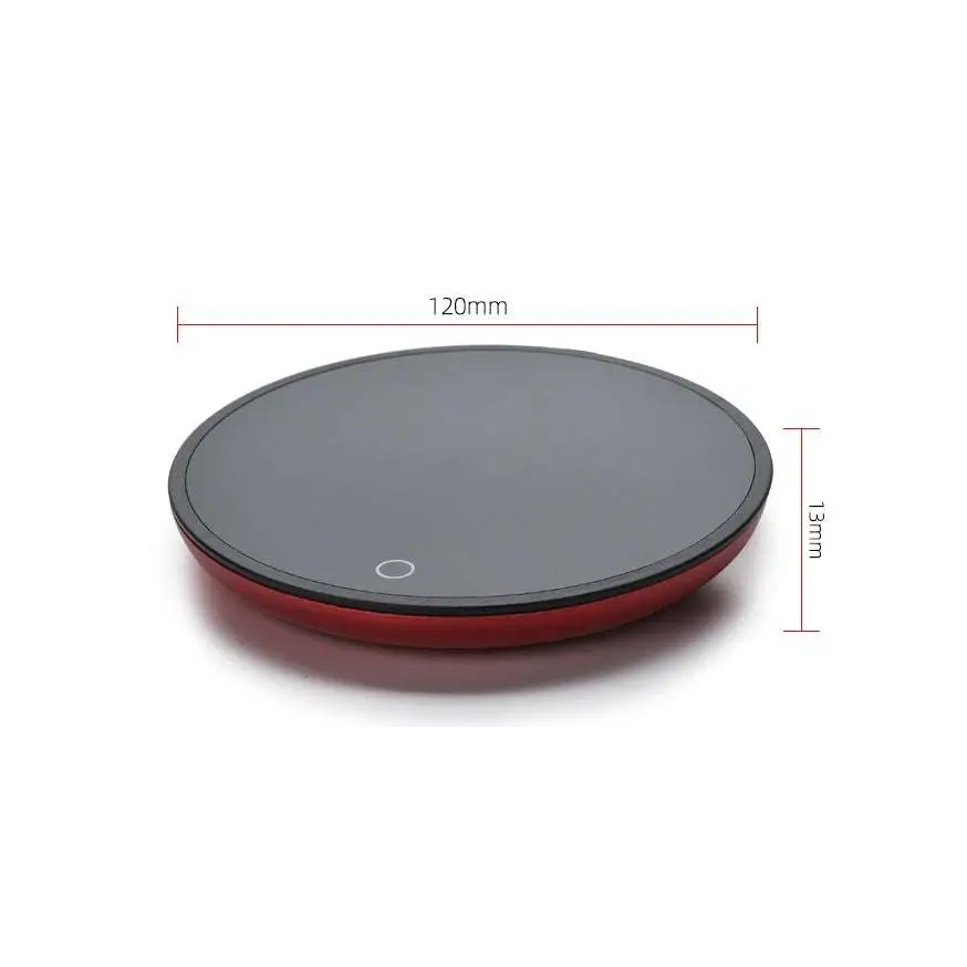 Ornate glass mug cup warmer with a red and black circular electric matte finish pad for tea and coffee