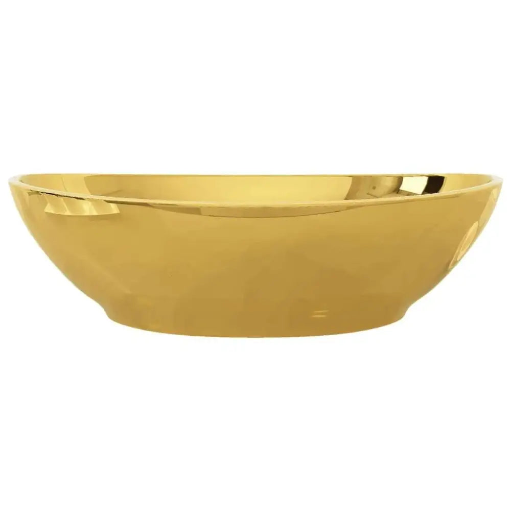 A sleek oval gold ceramic wash basin 40x33 cm with a smooth reflective metallic finish and ceramicoverall dimensions