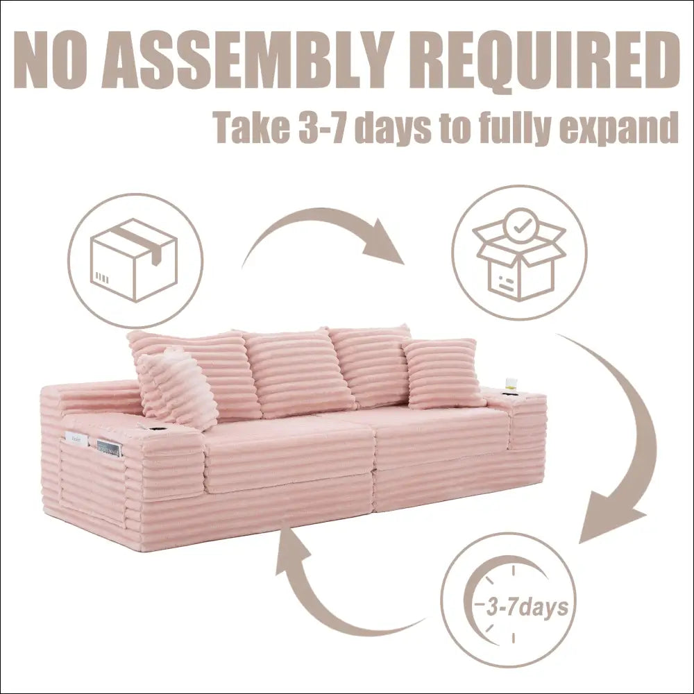 Oversized boneless four seats sofa in pink corduroy with ribbed texture and built-in cup holders