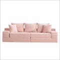 Pink oversized boneless four seats sofa in corduroy with ribbed texture and matching pillows for comfortable seating