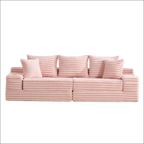 Pink oversized boneless four seats sofa in corduroy with ribbed texture and matching pillows for comfortable seating