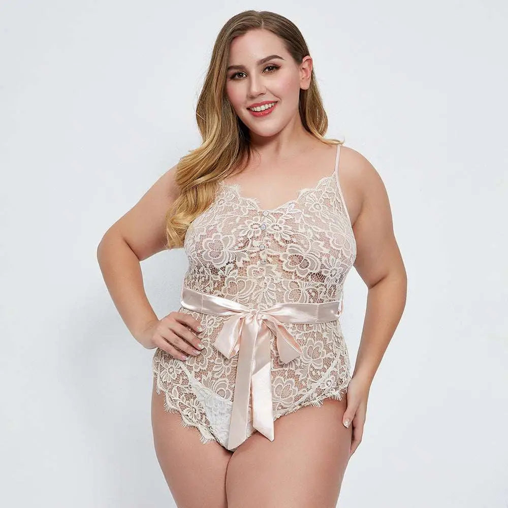 A beige oversized lace bodysuit featuring delicate lace material and a satin ribbon belt tied in a bow at the waist
