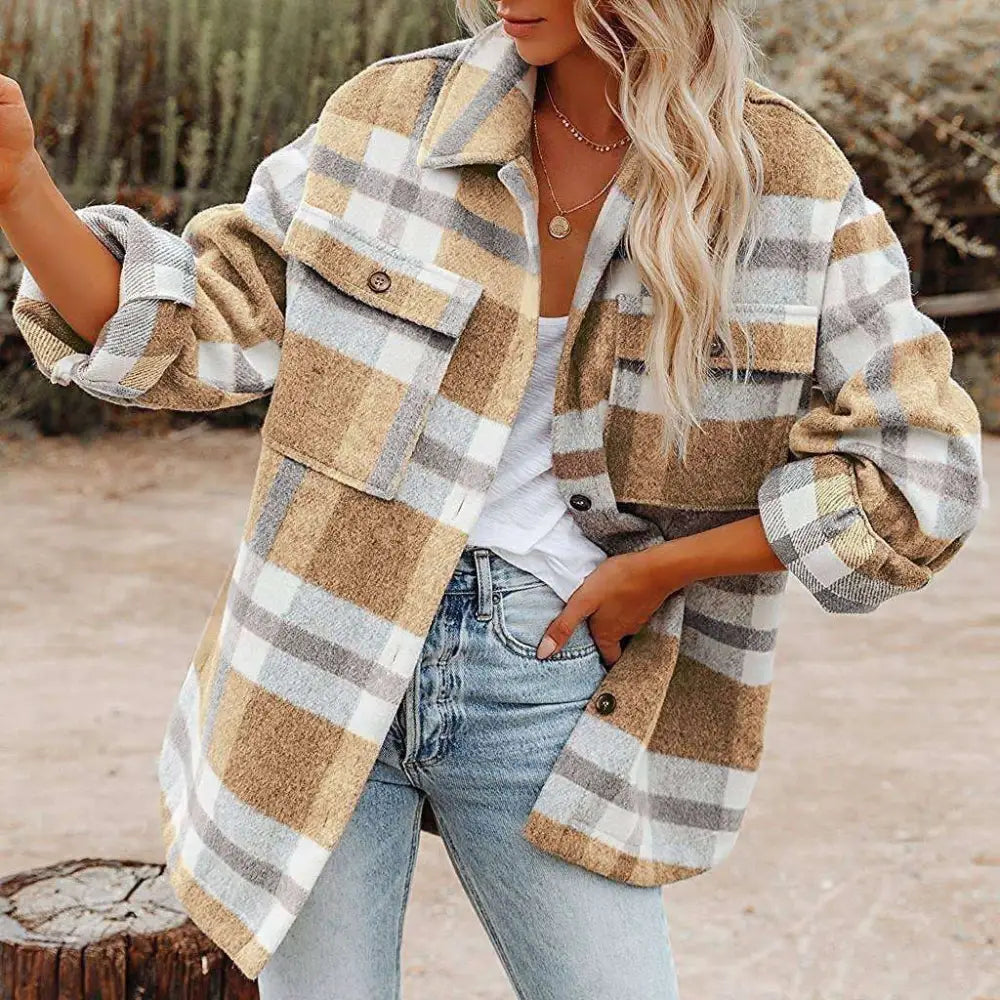 A cozy oversized plaid button flannel woolen shirt in tan and gray with buttoned chest pockets
