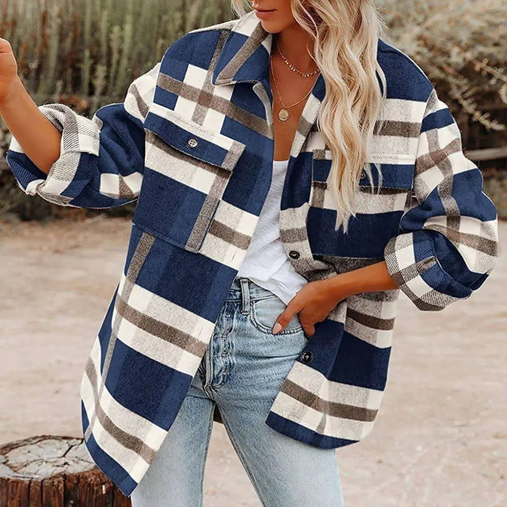 A cozy oversized plaid button flannel woolen shirt in navy white and gray with buttoned front pockets