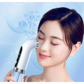 White and silver facial cleansing oxygen bubble blackhead remover pore vacuum with curved nozzle emitting bubbles