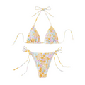 Pastel floral bikini set featuring smocked fabric and tie-side strings for a stylish summer look
