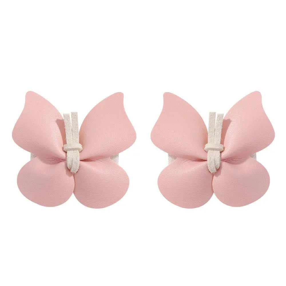 Pink leather butterfly bag clip children’s barrettes with soft matte finish and white elastic bands for hair styling