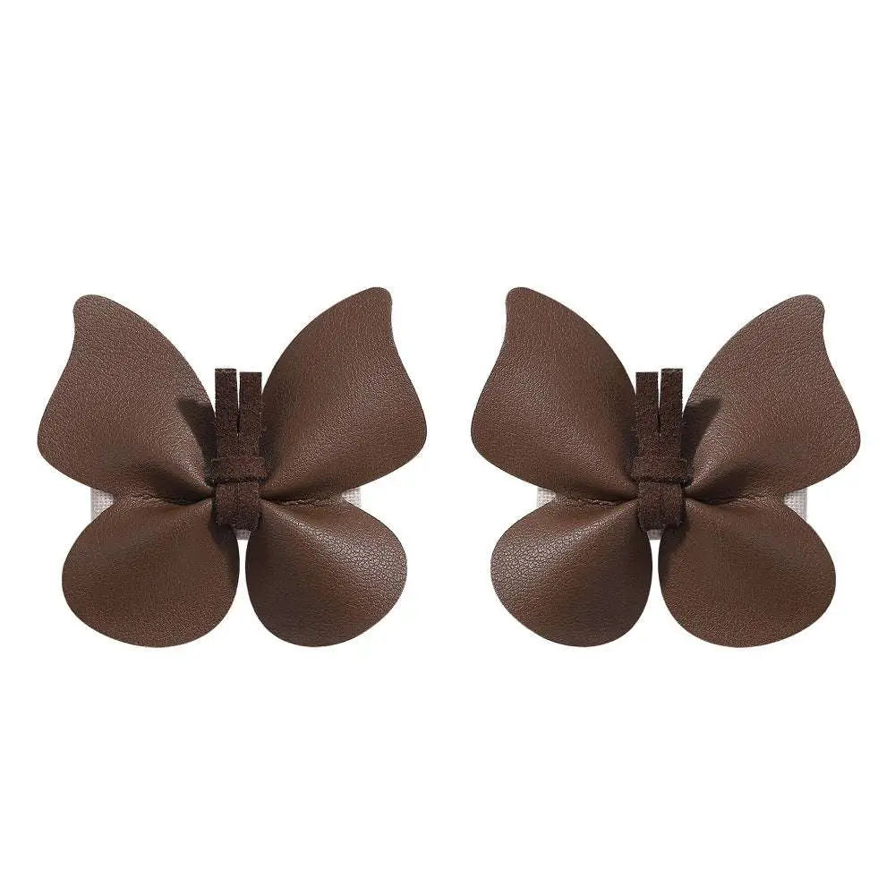 Brown leather butterfly bag clip children’s barrettes featuring pastel leather butterfly design for kids hair styling