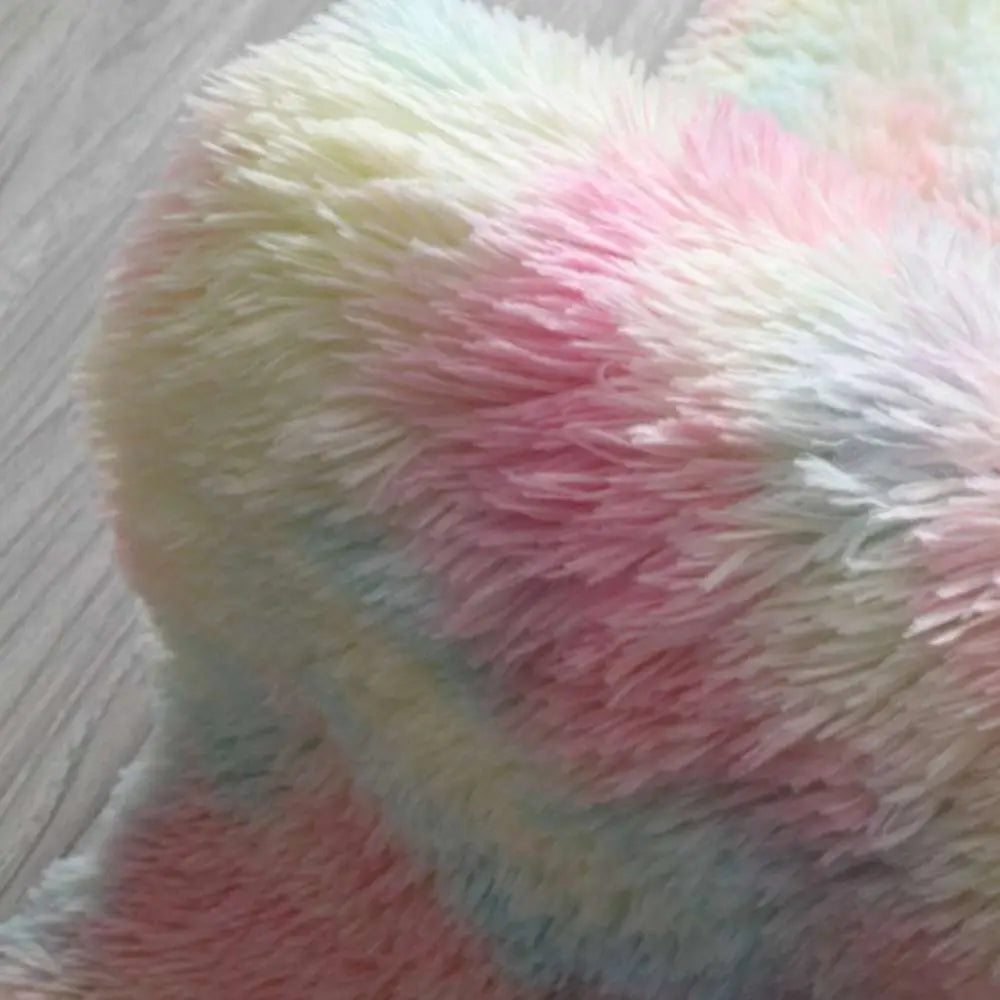 A soft fluffy pastel rainbow nordic living room carpet with fuzzy texture in diameter round shape with pastel hues