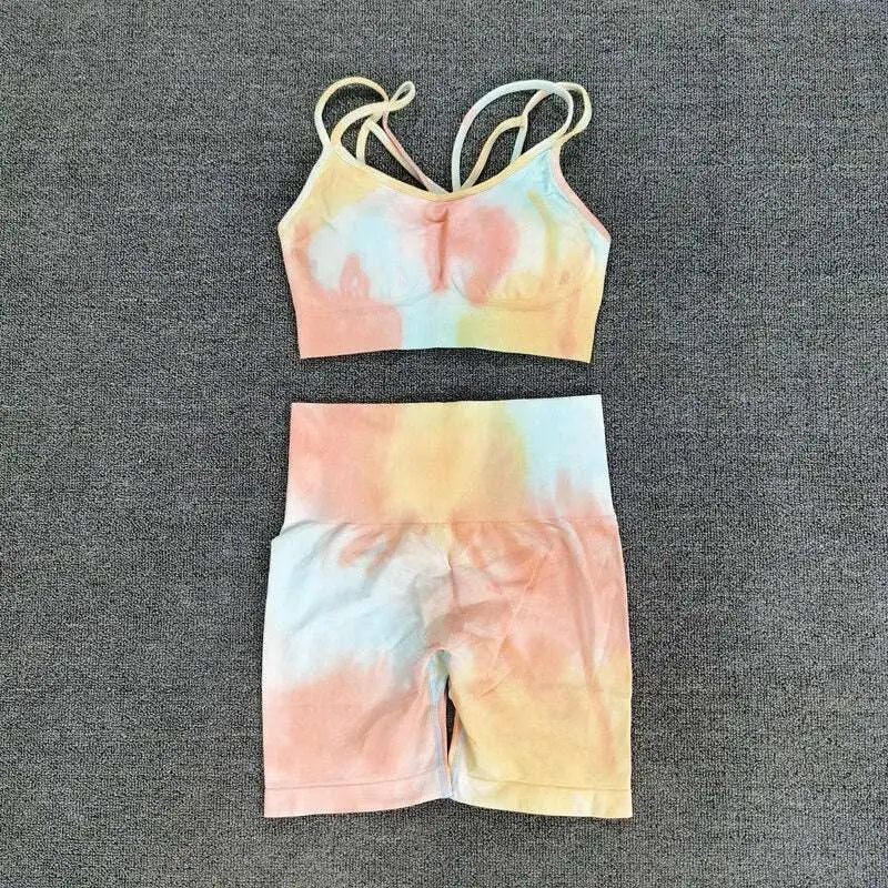 Pastel tie dye crop bra and high waisted shorts workout set with crisscross straps for activewear use