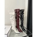 Three glossy thigh high boots in white burgundy and black patent with crinkled faux leather and autumn stiletto heel designs