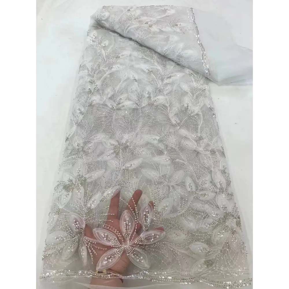 Peach ribbon flower beaded tulle lace fabric with delicate white floral embroidery and sparkling silver beads