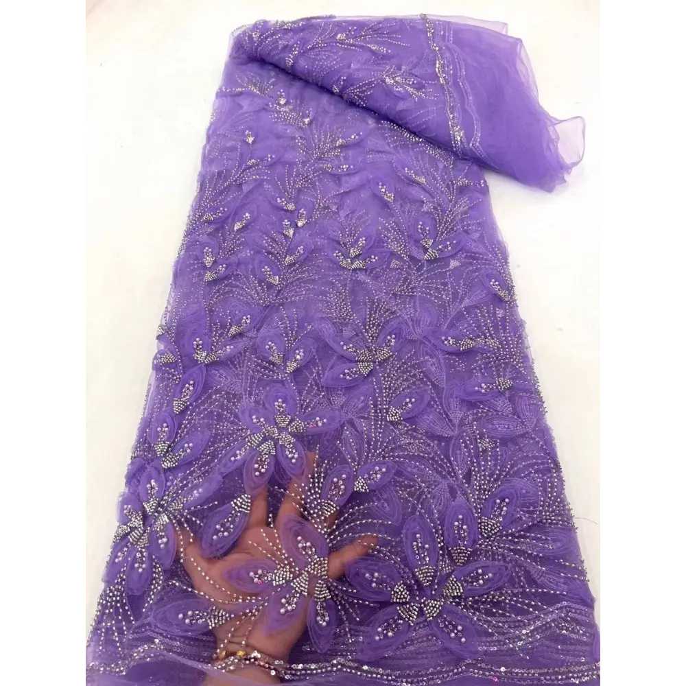 Purple peach ribbon flower beaded tulle lace fabric with intricate floral embroidery and sparkling silver beading