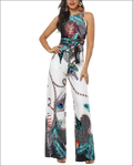 A vibrant peacock feather print jumpsuit with high neckline, wide-leg pants, and matching belt tied at the waist